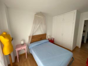 Posteľ alebo postele v izbe v ubytovaní Apartamento RITS Beachfront