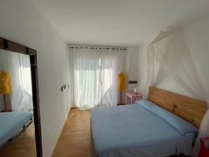 Posteľ alebo postele v izbe v ubytovaní Apartamento RITS Beachfront