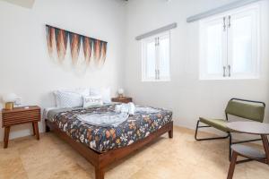 Voodi või voodid majutusasutuse 2-BR Apt centrally located in OSJ! toas