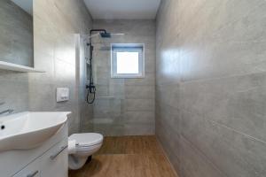 Koupelna v ubytování APARTMAN DINO