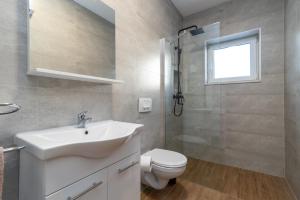 Koupelna v ubytování APARTMAN DINO
