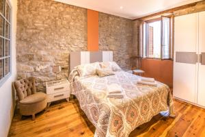 Posteľ alebo postele v izbe v ubytovaní Ronda del Castillo