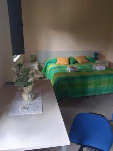 Postel nebo postele na pokoji v ubytování Punto Accoglienza POLICASTRELLO