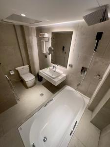 Koupelna v ubytování Hotel Omni Residency Baridhara