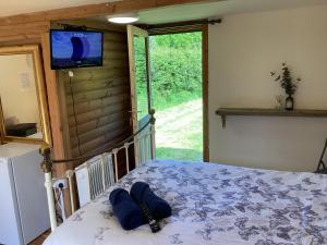 Llit o llits en una habitació de Cabin 4