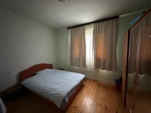 מיטה או מיטות בחדר ב-Apartman Ljubicica