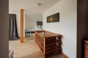 A bed or beds in a room at Biergasthof Riedberg