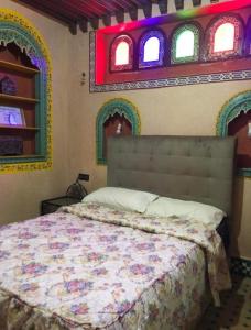 En eller flere senger på et rom på Riad Razoli Sidi Fateh