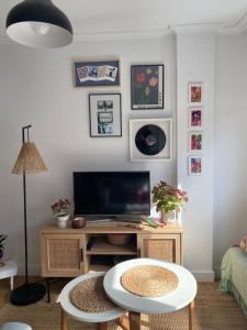 TV a/nebo společenská místnost v ubytování Rincón de Beluso, Bueu + 3 fotografie