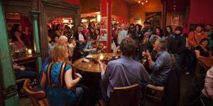 a crowd of people standing in a room at Hootananny in Inverness