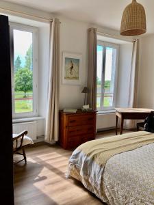 Posteľ alebo postele v izbe v ubytovaní La Maison du Hommeel