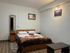 Postel nebo postele na pokoji v ubytování Pradhan Homestay Mirik - Homestay beside Mirik Lake