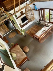an overhead view of a living room with a hammock at Jandaia Atins in Atins