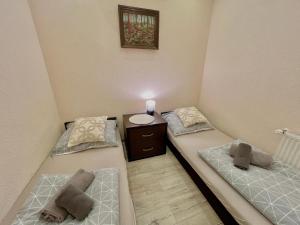 Giường trong phòng chung tại Apartament Karkonoska Karpacz By Przycup w Karkonoszach