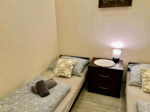 Postel nebo postele na pokoji v ubytování Apartament Karkonoska 19 Karpacz by Przycup w Karkonoszach Apartamenty Karpacz Centrum Karkonosze