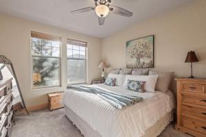 a bedroom with a bed and a ceiling fan at Foxpoint 1678C by Moose Management in Park City