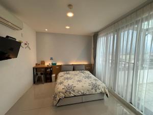 Letto o letti in una camera di 充電樁 羅東雲朵朵Cloud B&B免費洗衣機 烘衣機 近週三清溝 星巴克咖啡豆 國旅卡特約店