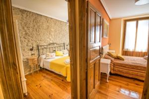 Posteľ alebo postele v izbe v ubytovaní Ronda del Castillo