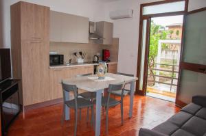 Kuchyň nebo kuchyňský kout v ubytování Casa Vacanze Caruso