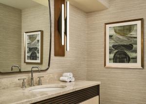 a bathroom with a sink and a mirror at The Ritz-Carlton, Denver in Denver