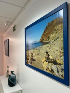 Televízia a/alebo spoločenská miestnosť v ubytovaní Hostal Juan Carlos
