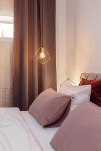 Postel nebo postele na pokoji v ubytování DSE Apartment + 24 fotografií