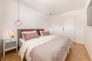Postel nebo postele na pokoji v ubytování DSE Apartment