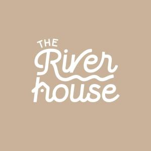 a sign for the river house logo at The River House in Boiano