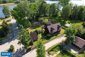 an overhead view of a house with trees and a street at Domek typu Mikołajki na Ośrodku Wędkarsko-Turystycznym Rybaczówka in Turawa