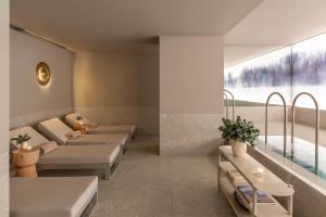 a waiting room with beds and a large window at Casa Lucia Member of Melia Collection in Buenos Aires +185 photos