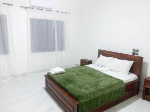 Llit o llits en una habitació de Villa luxueuse - front de mer - vue sur la mer