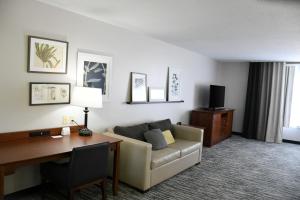 Area tempat duduk di Country Inn & Suites by Radisson, Fort Dodge, IA