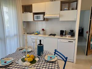 Kuchyň nebo kuchyňský kout v ubytování Alba Apartment
