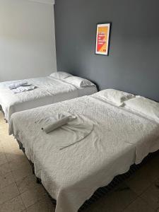 Posteľ alebo postele v izbe v ubytovaní Hotel Vitrine