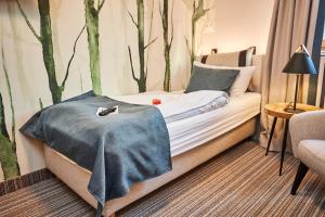 Postel nebo postele na pokoji v ubytování Flair Hotel Werbetal