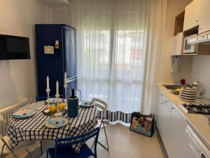 Kuchyň nebo kuchyňský kout v ubytování Alba Apartment + 4 fotografie