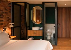 Koupelna v ubytování Nomada Hotel Origen