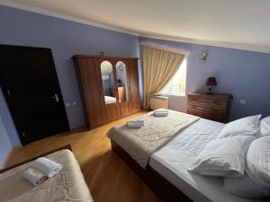 Postel nebo postele na pokoji v ubytování Guesthouse Emilya