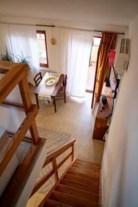 an overhead view of a living room with a table at Sardinian Gallery Porto in Porto Alabe