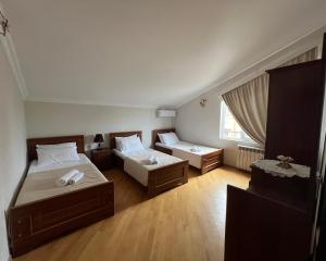 Postel nebo postele na pokoji v ubytování Guesthouse Emilya