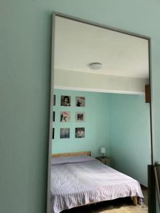 Postel nebo postele na pokoji v ubytování B&B il riccio