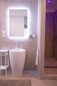 Et badeværelse på Chic Appart - Sauna privatif