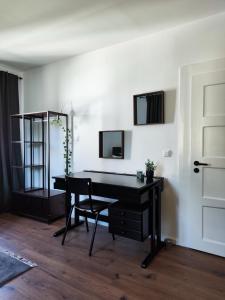 TV a/nebo společenská místnost v ubytování Elias modern Lifestyle
