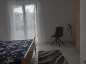 Postel nebo postele na pokoji v ubytování Apartmani Miletić