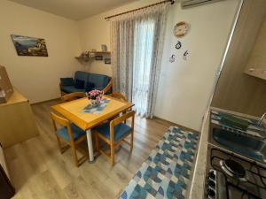 Η κουζίνα ή μικρή κουζίνα στο App4rent Residence Gaia 12 - in centro, con piscina, posto auto...