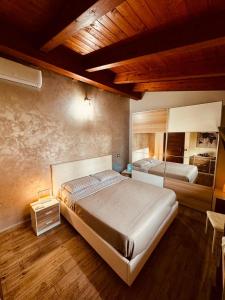 a bedroom with two beds in a room at Turi Agropoli in Agropoli