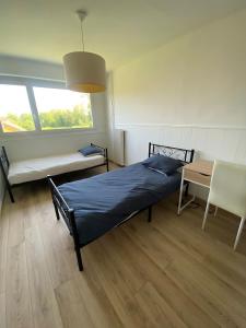 Postel nebo postele na pokoji v ubytování Vue du Doubs T4 cosy très bien situé
