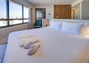 Radisson São Paulo Paulista客房内的一张或多张床位