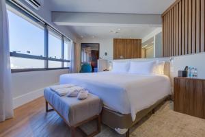 Radisson São Paulo Paulista客房内的一张或多张床位