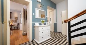 a hallway with a white dresser and a mirror at Villa Celio-Cega for 4+2, Trogir center in Trogir